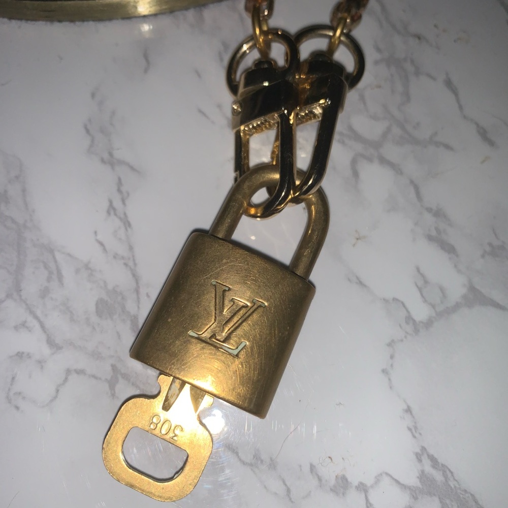 Louis Vuitton Lock and Key Necklace.